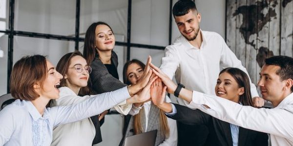 Group of people working out business plan in an office